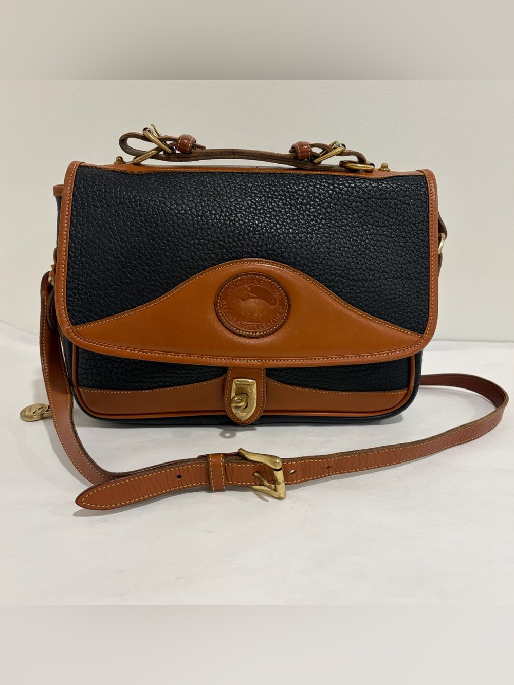 Dooney & Bourke Black and Brown Pebbled Leather Satchel brass Hardware crossbody